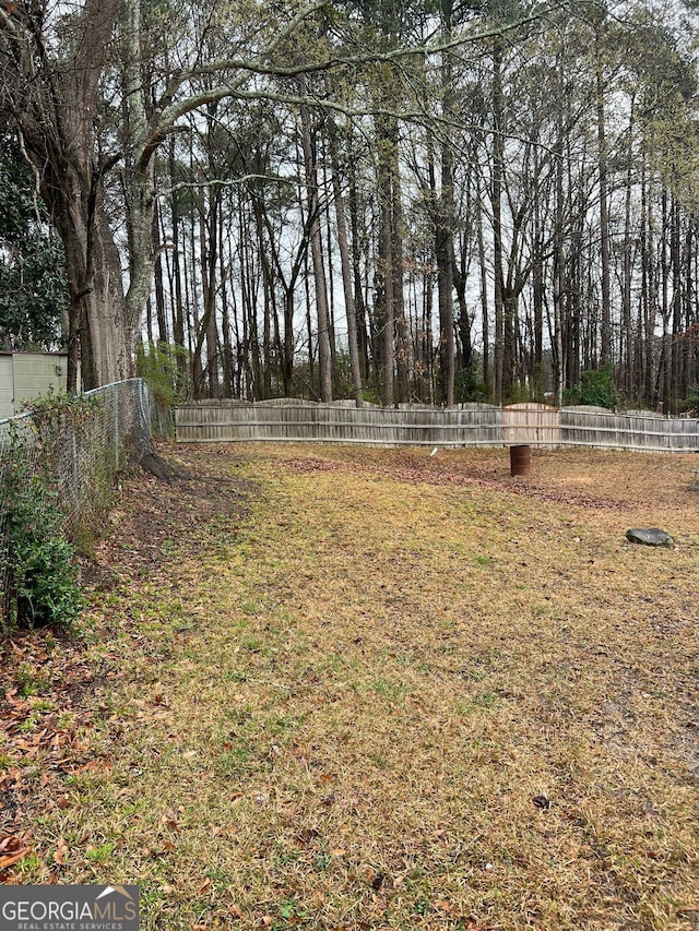 view of yard featuring fence