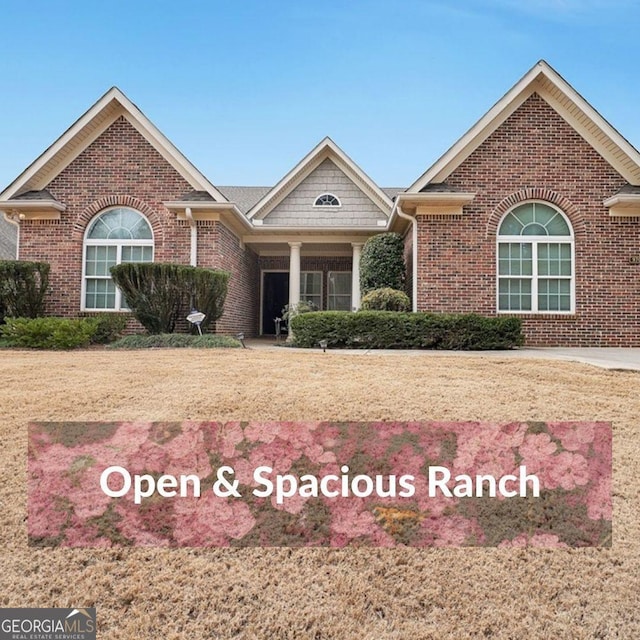 ranch-style house with brick siding