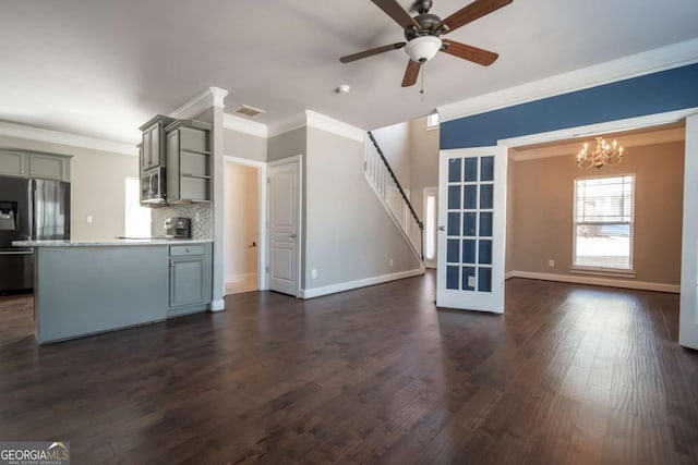 kitchen featuring open shelves, dark wood-style flooring, gray cabinetry, ornamental molding, and appliances with stainless steel finishes