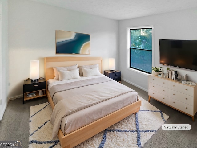 bedroom featuring baseboards