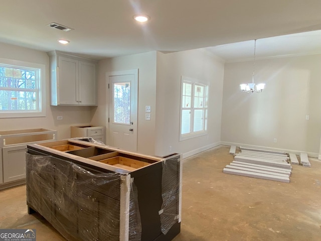 kitchen with recessed lighting, visible vents, baseboards, and plenty of natural light