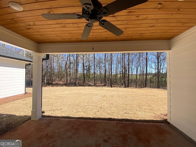 view of yard featuring ceiling fan