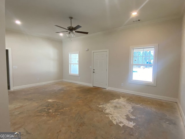 unfurnished room featuring visible vents, unfinished concrete floors, crown molding, and baseboards