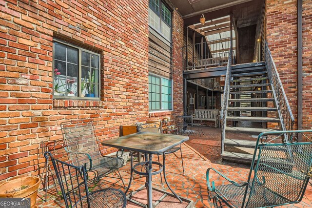 1284 Piedmont Ave NE Unit 12, Atlanta, GA 30309 - view of patio / terrace with stairs