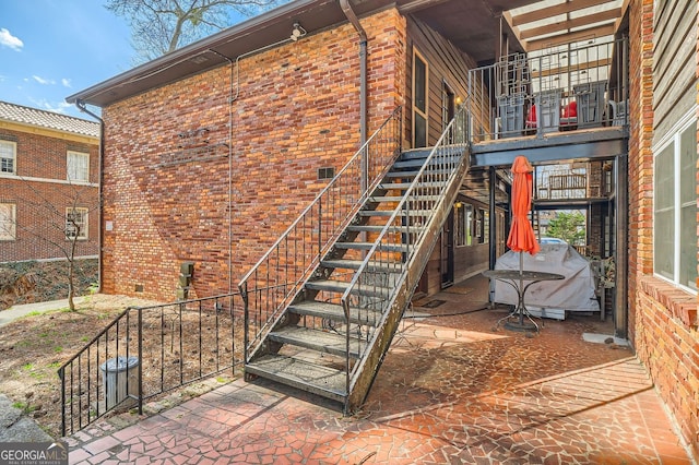 1284 Piedmont Ave NE Unit 12, Atlanta, GA 30309 - doorway to property featuring crawl space and brick siding