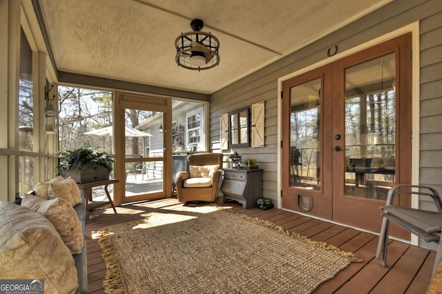 sunroom featuring french doors