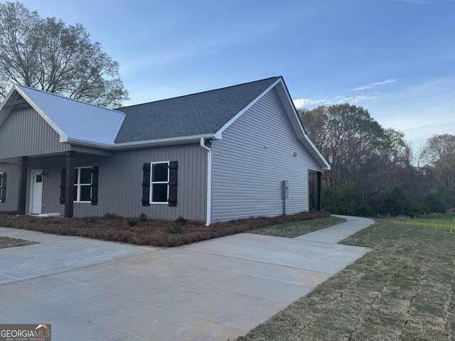 rear view of house with a patio, french doors, and ceiling fan