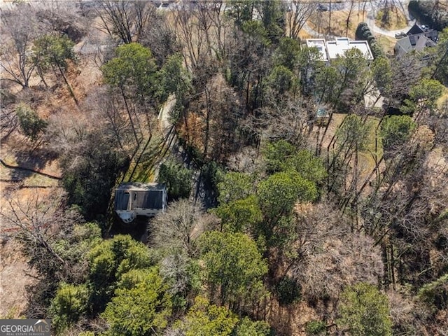 aerial view featuring a view of trees