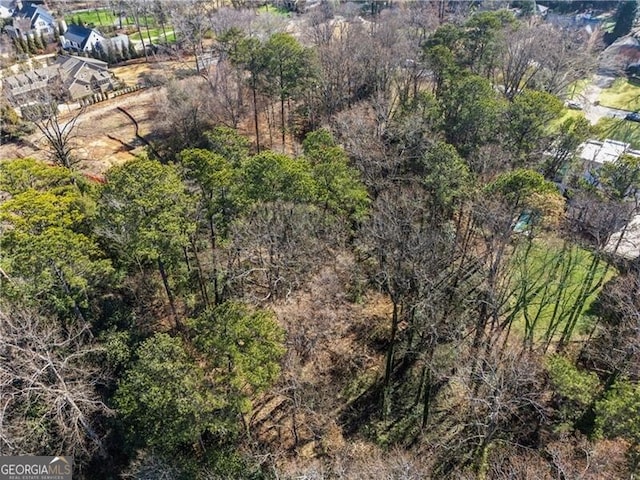 drone / aerial view with a forest view