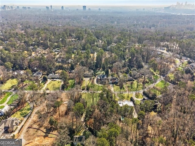 drone / aerial view with a forest view