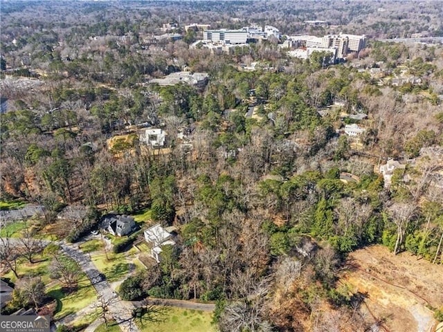 drone / aerial view with a forest view