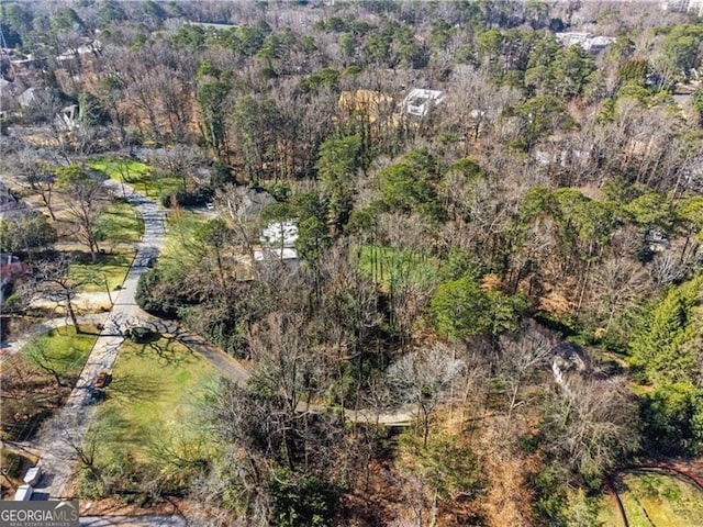 bird's eye view featuring a forest view