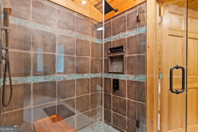 bathroom featuring a stall shower