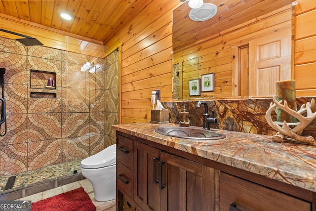 bathroom featuring a shower stall, wood ceiling, toilet, tile patterned floors, and vanity