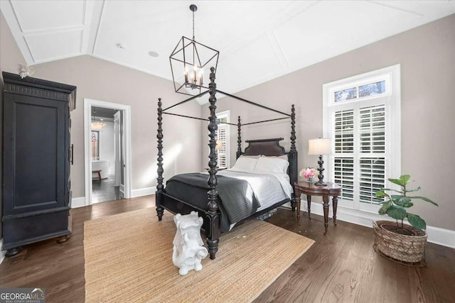 bedroom with multiple windows, baseboards, lofted ceiling, and dark wood-style flooring