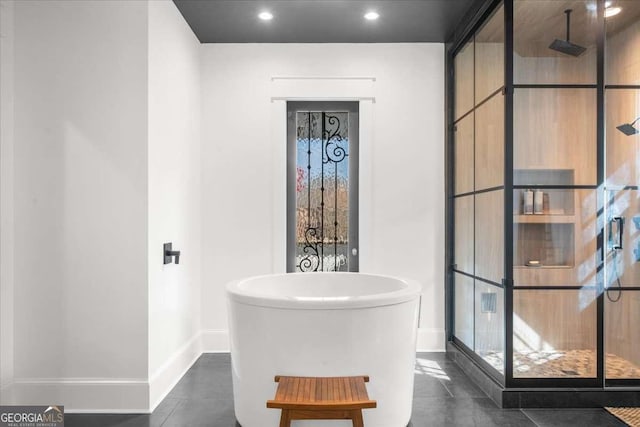 135 Newcastle Ct, Roswell, GA 30076 - full bath with a stall shower, a freestanding bath, and recessed lighting