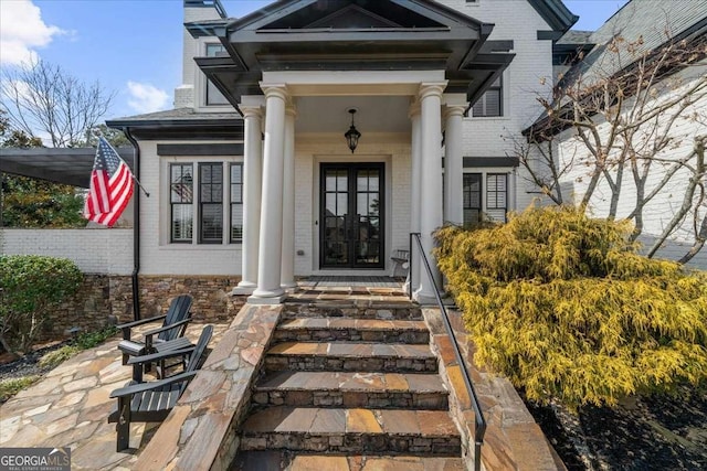 135 Newcastle Ct, Roswell, GA 30076 - doorway to property with brick siding
