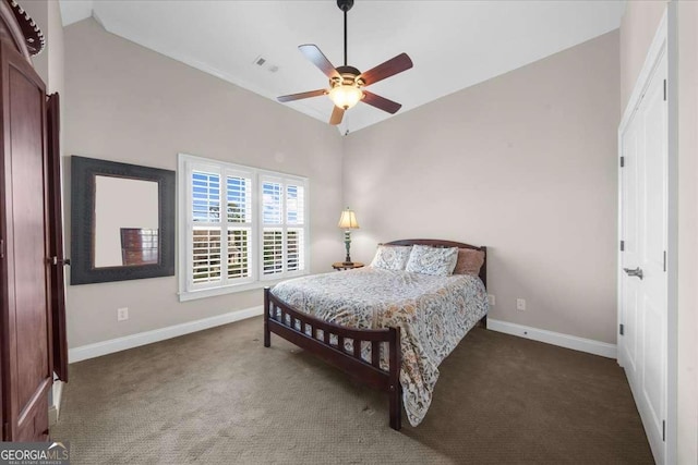 bedroom featuring visible vents, lofted ceiling, carpet flooring, baseboards, and ceiling fan