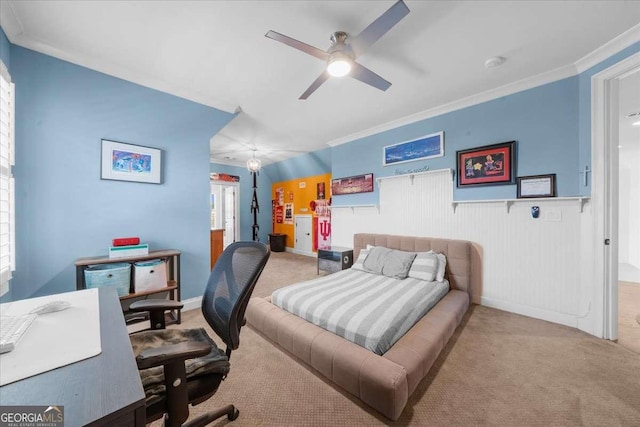 bedroom with crown molding, carpet flooring, and ceiling fan