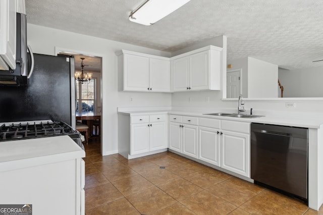 kitchen featuring a sink, dishwasher, light countertops, and white cabinetry