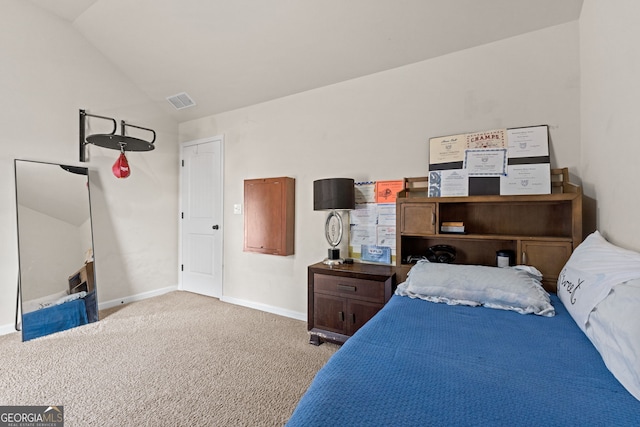 bedroom featuring baseboards, visible vents, lofted ceiling, and carpet floors