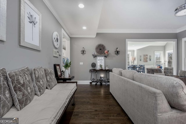 living area featuring recessed lighting, dark wood-type flooring, baseboards, and ornamental molding