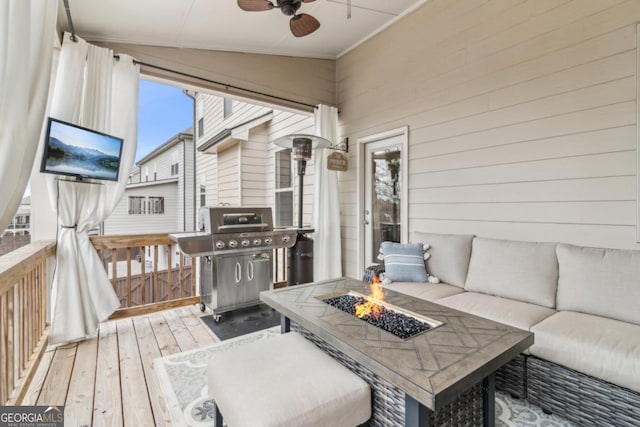 sunroom / solarium with lofted ceiling and ceiling fan