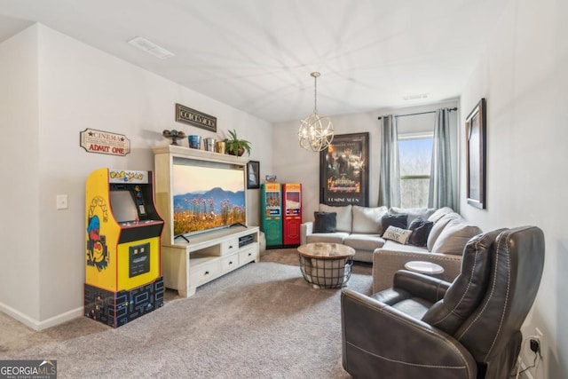 carpeted living area featuring a chandelier, visible vents, and baseboards