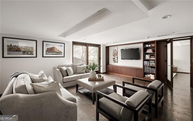 living room with expansive windows and wood finished floors