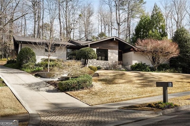 view of front of home featuring stone siding