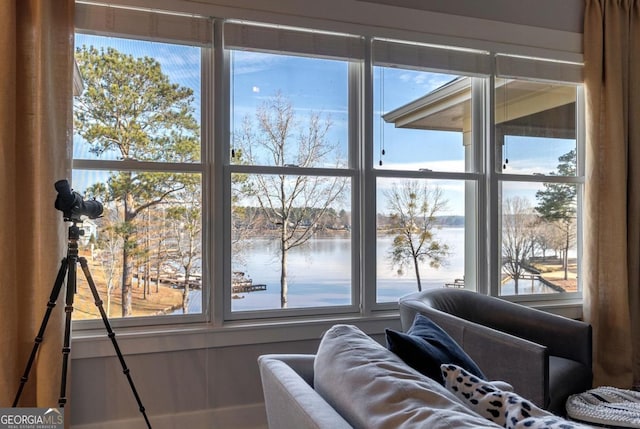 entryway with a healthy amount of sunlight and a water view