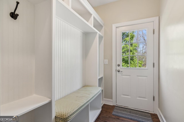 mudroom with baseboards and dark wood-style flooring