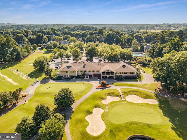 bird's eye view with view of golf course