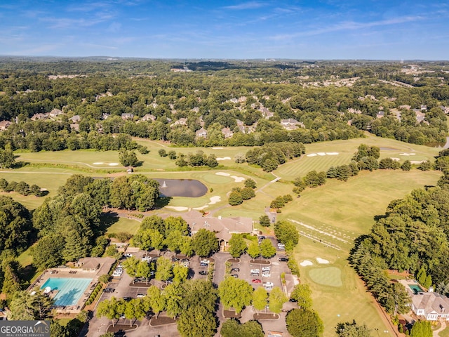 drone / aerial view featuring a water view and view of golf course