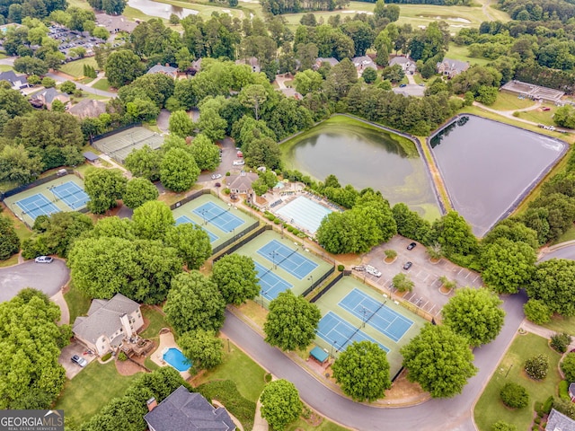 aerial view with a water view and a residential view