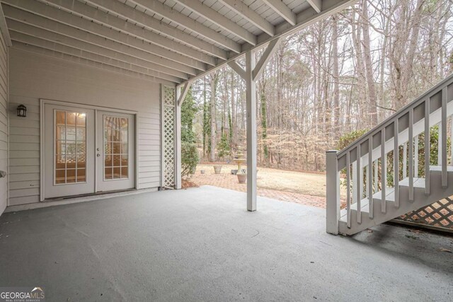 view of patio / terrace with french doors and stairs