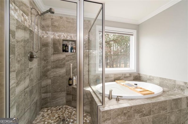 full bath featuring a stall shower, a garden tub, and ornamental molding