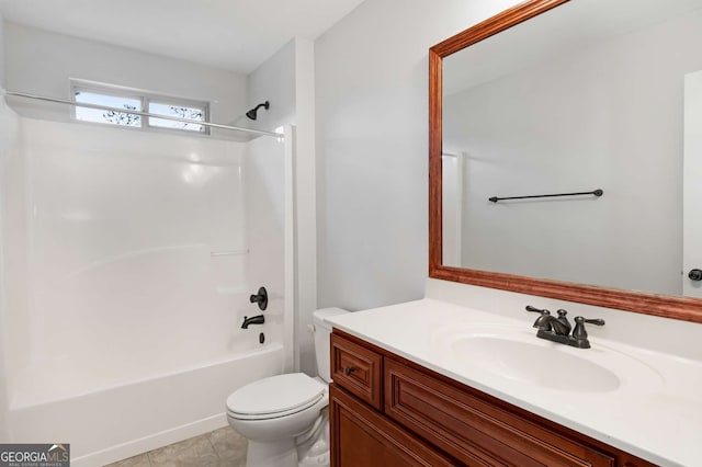 bathroom with tile patterned flooring, toilet, vanity, and shower / bathing tub combination