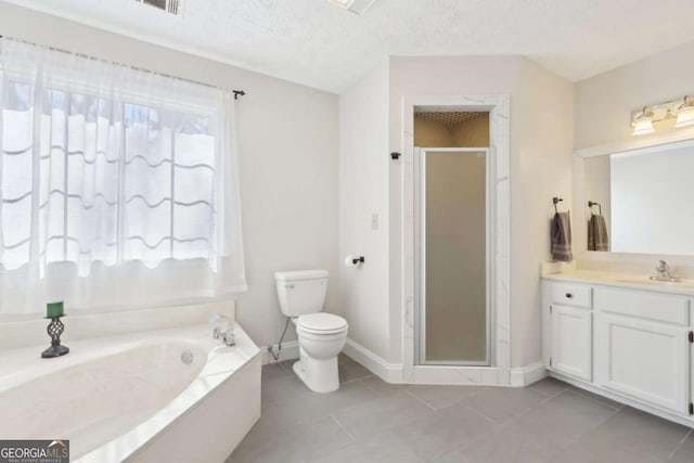 full bathroom with vanity, a stall shower, a garden tub, toilet, and tile patterned floors