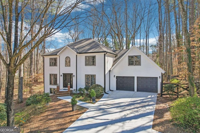 view of front of house with driveway and a garage