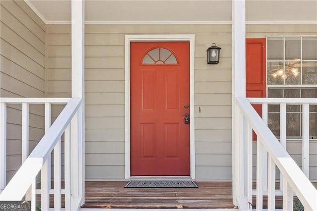 entrance to property with a porch