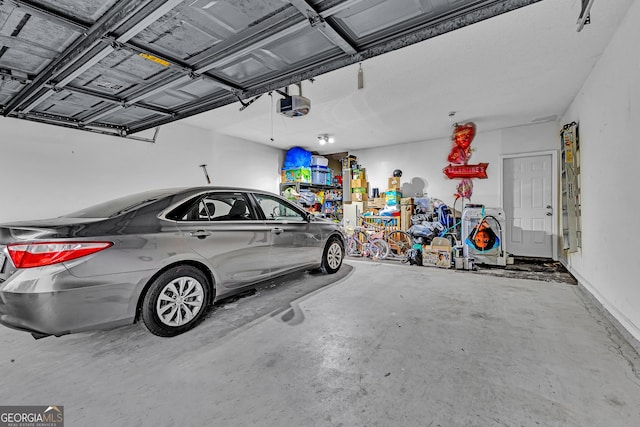 garage featuring a garage door opener