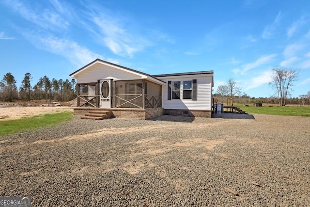 manufactured / mobile home with crawl space and a sunroom