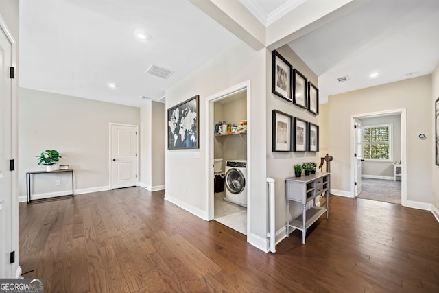 corridor with visible vents, dark wood-type flooring, and baseboards