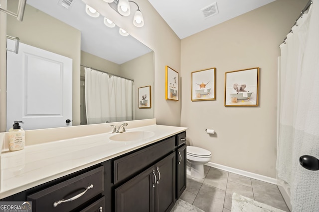 full bath with visible vents, toilet, tile patterned flooring, baseboards, and vanity