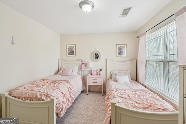 bedroom with visible vents