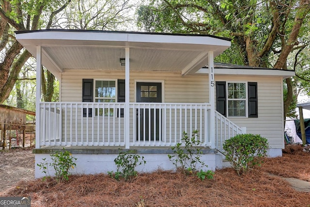 view of front of property featuring covered porch