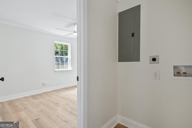 laundry room featuring hookup for a washing machine, electric panel, baseboards, and electric dryer hookup