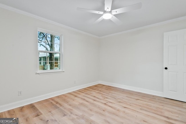 empty room featuring crown molding, a ceiling fan, baseboards, and light wood-type flooring