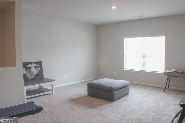 sitting room with recessed lighting, baseboards, and carpet